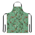 Lively and vibrant green apron featuring a monkey-themed floral design, perfect for the eco-conscious kitchen.