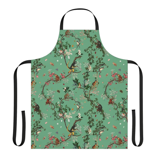 Lively and vibrant green apron featuring a monkey-themed floral design, perfect for the eco-conscious kitchen.