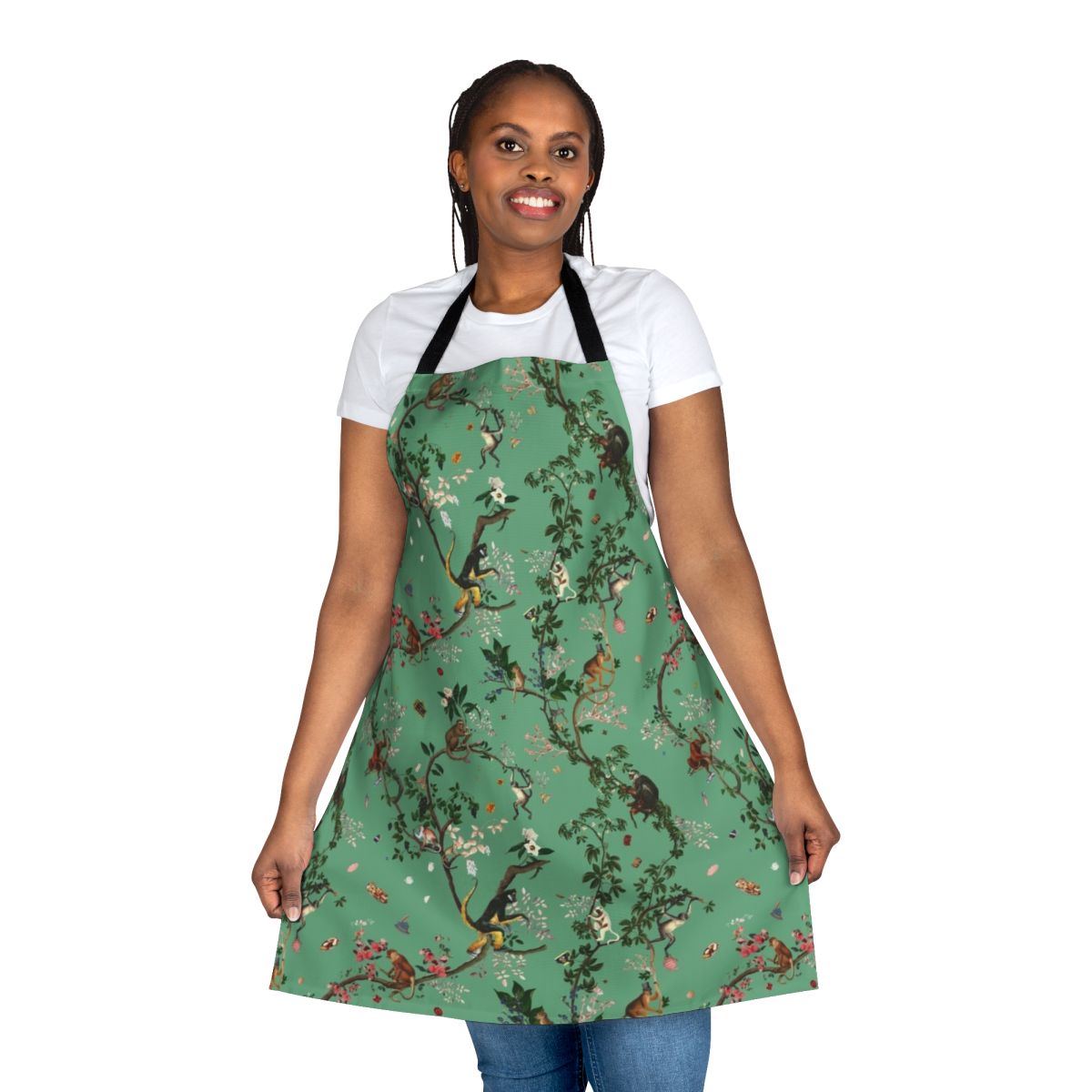 Lively and vibrant green apron featuring a monkey-themed floral design, perfect for the eco-conscious kitchen.