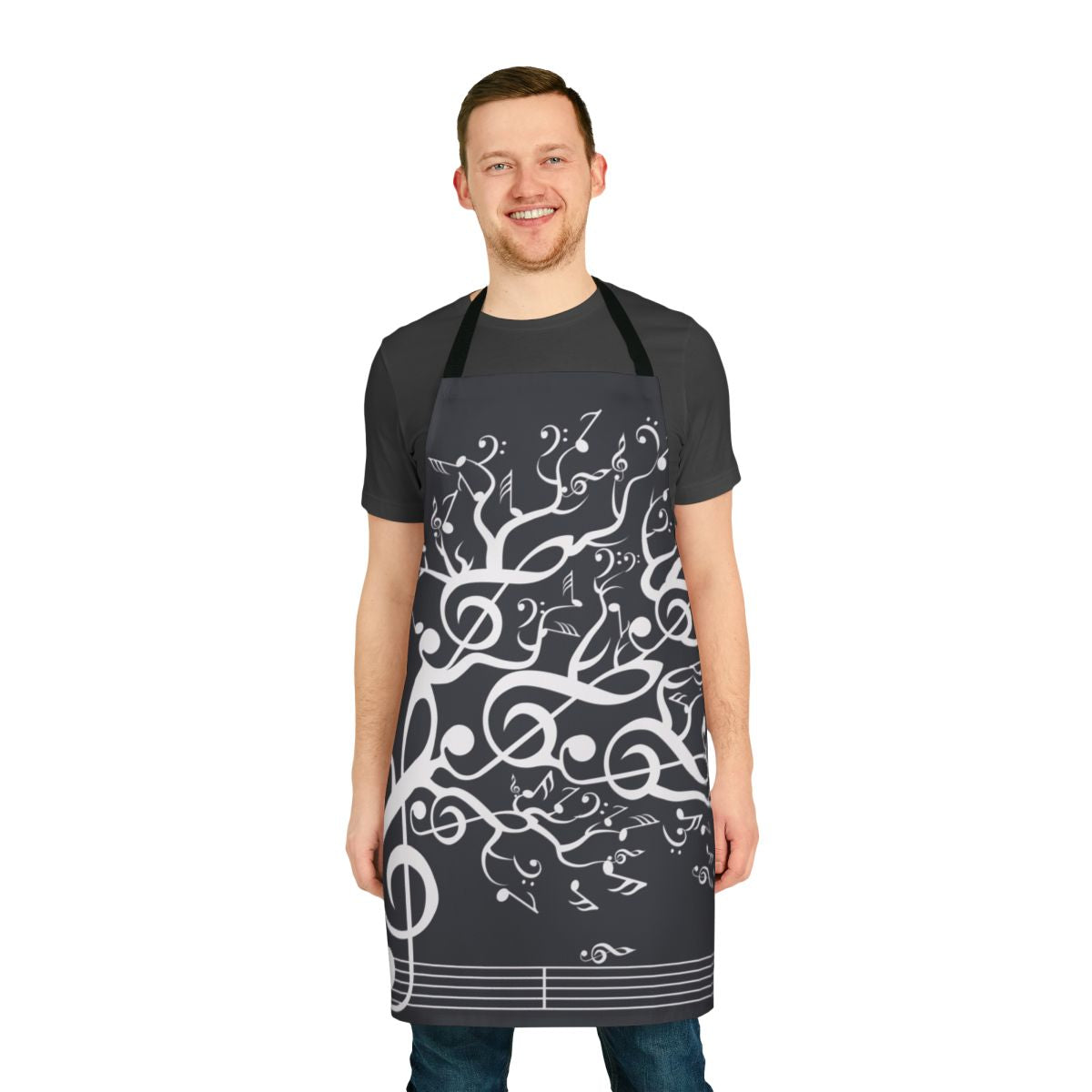 An apron featuring a nature-inspired design with musical notes and elements
