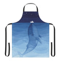 Vibrant watercolor illustration of a blue whale on a navy blue apron