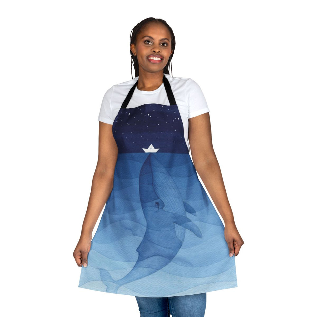 Vibrant watercolor illustration of a blue whale on a navy blue apron