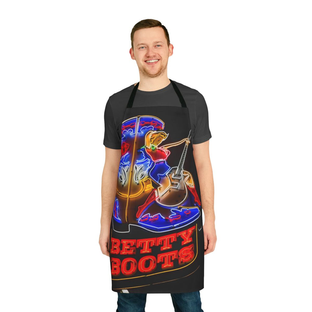 Vibrant neon apron with cowgirl boots, guitar, and country music theme