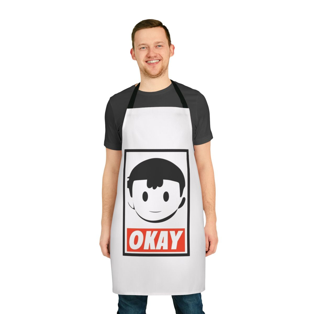 Ness-inspired parody apron with "Okay" design for Earthbound and Super Smash Bros fans
