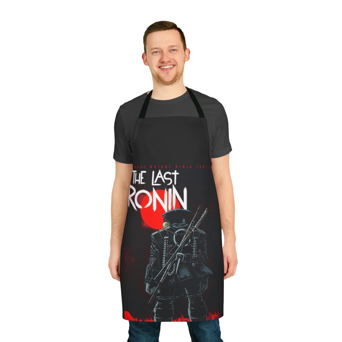 A black apron with a graphic design of the Last Ronin from the Teenage Mutant Ninja Turtles franchise.