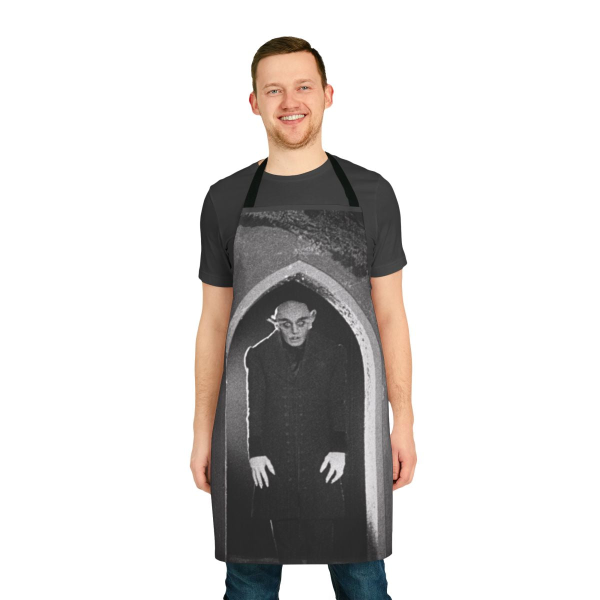 A black apron featuring the iconic image of Count Orlok from the classic silent horror film Nosferatu.