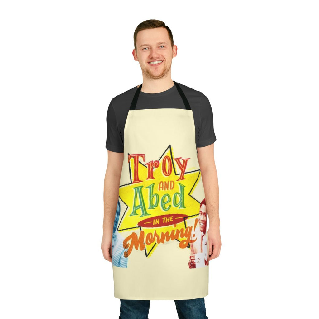 Troy and Abed from the TV show Community wearing a morning show-inspired apron
