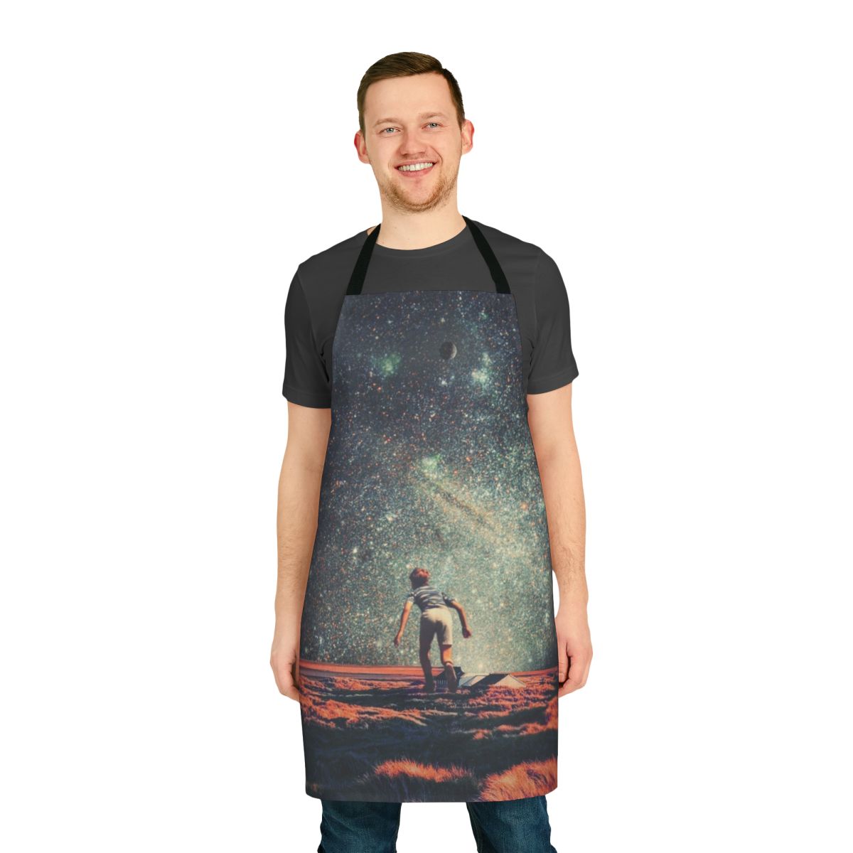 Nostalgic retro-style apron with a whimsical space-themed graphic design featuring planets, stars, and a dreamy cosmic landscape.