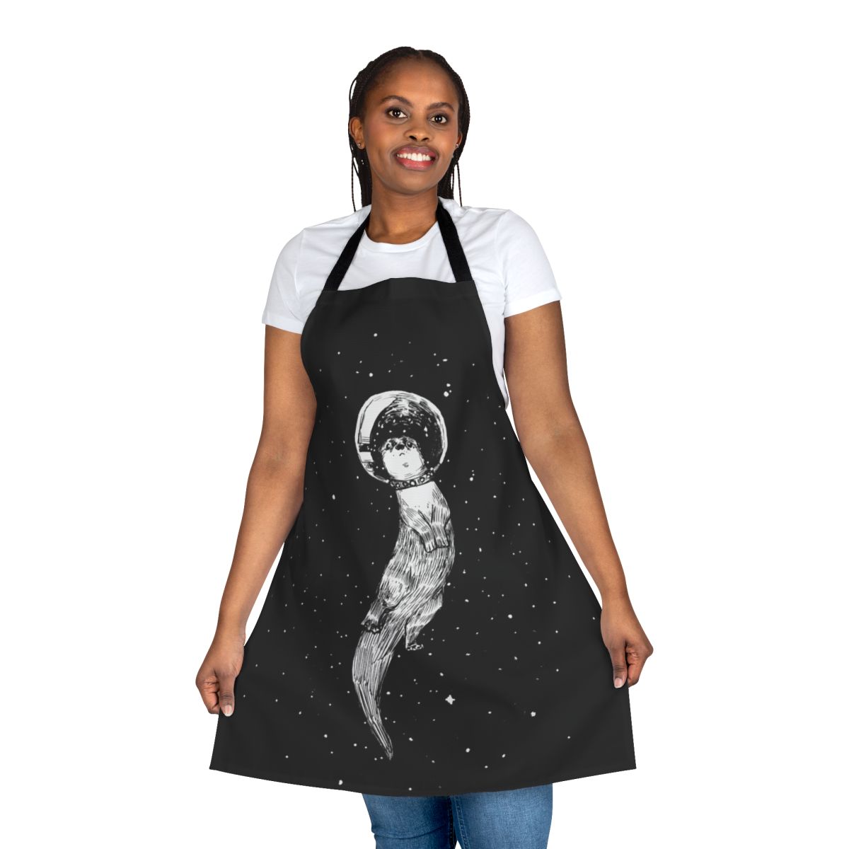 Whimsical apron with an illustration of an otter floating peacefully through a starry outer space scene