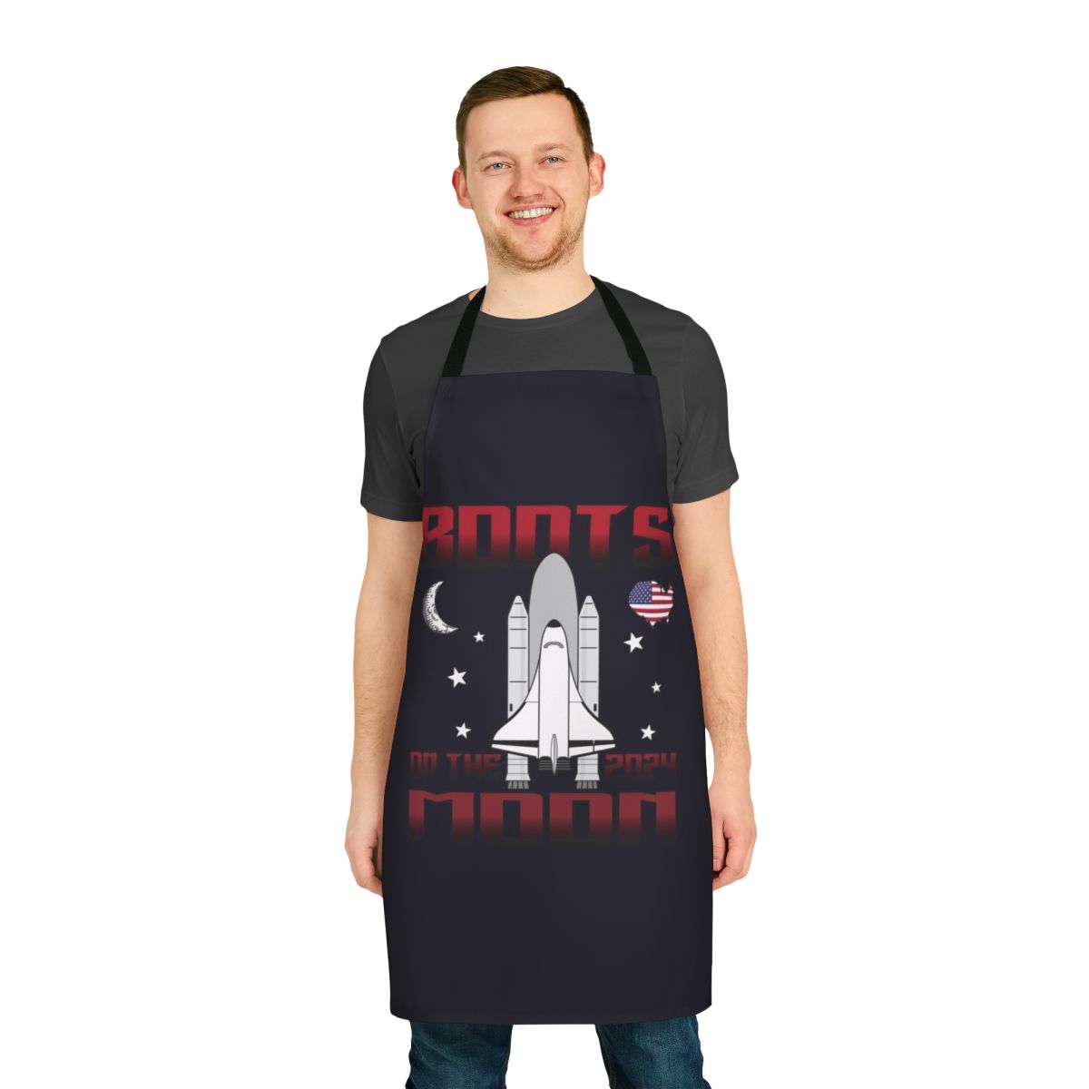 Space-themed apron with "Boots on the Moon" quote and rocket ship design