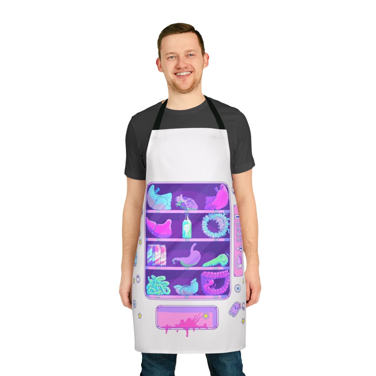 A pastel pink apron featuring cartoon-style organs and a creepy cute design, perfect for the macabre fashion enthusiast.