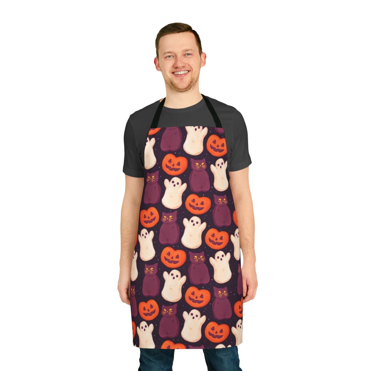 Patterned apron featuring cute pumpkins, ghosts, and halloween cats - perfect for spooky and sweet holiday baking
