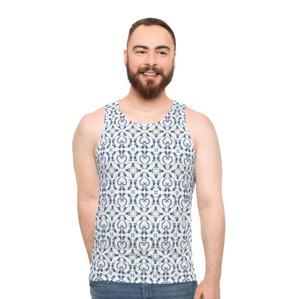 Blue unisex tank top with paw print and heart-shaped floral pattern