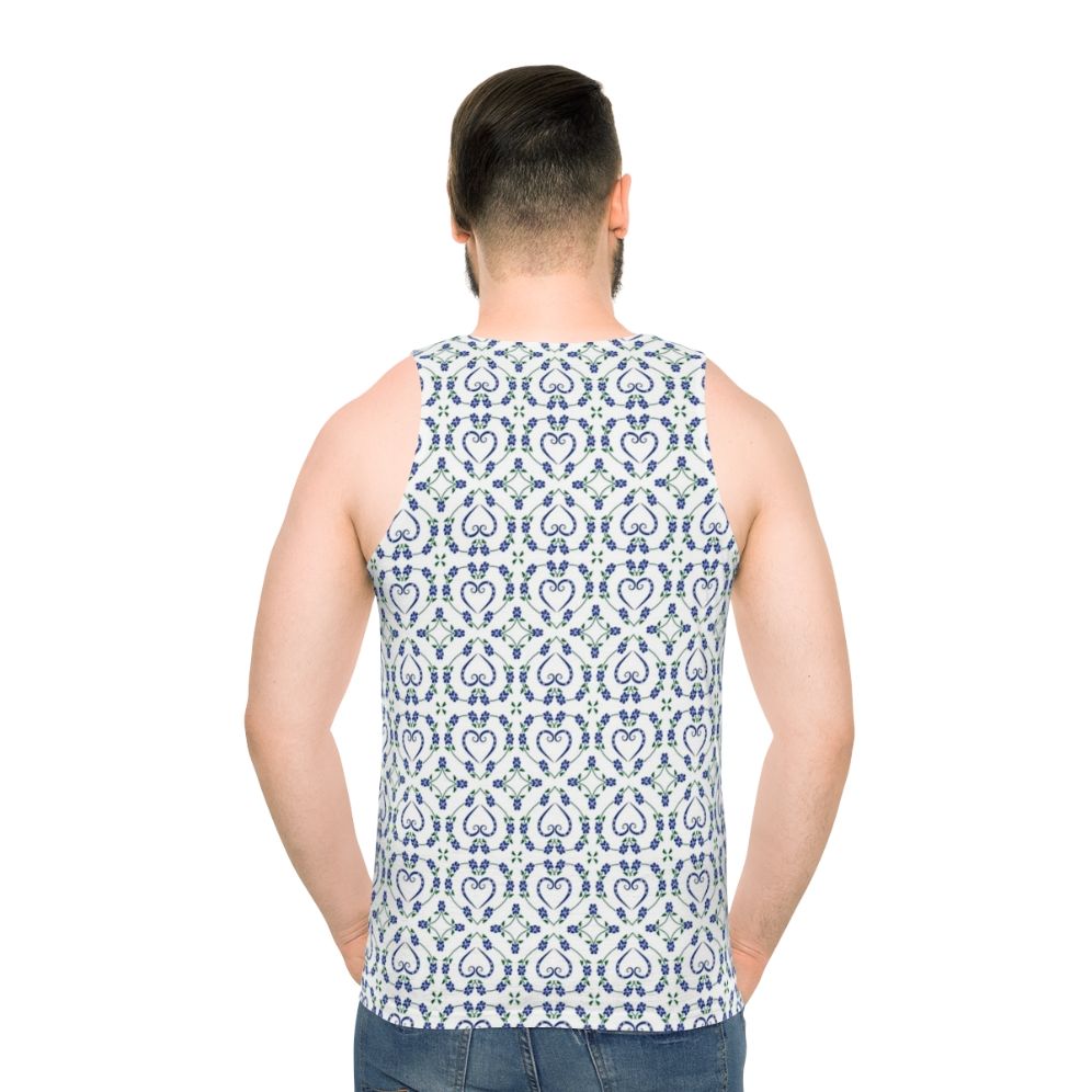 Blue unisex tank top with paw print and heart-shaped floral pattern