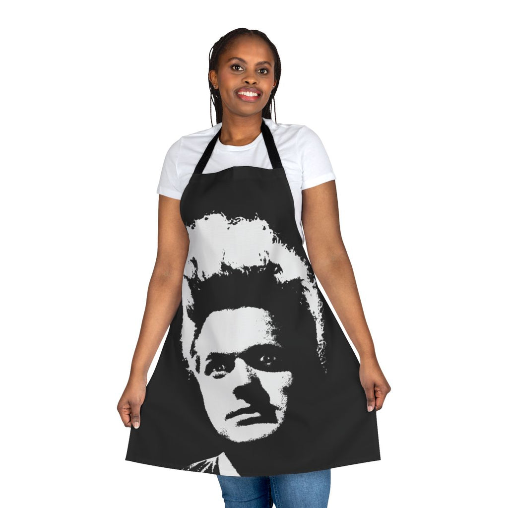 A striking apron featuring surreal and avant-garde imagery, perfect for fans of David Lynch and other cult directors.