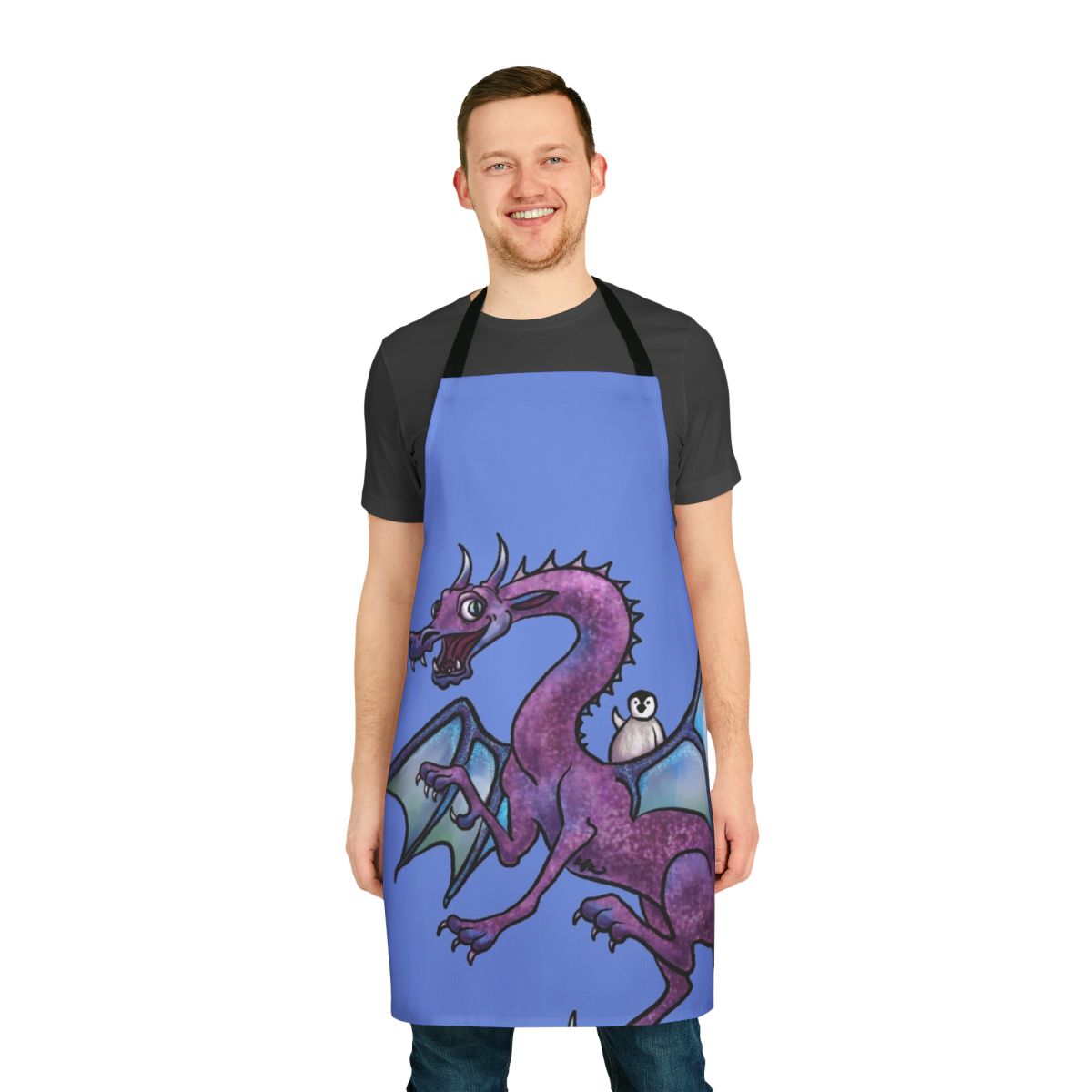 Penguin and dragon in flight, wearing capes, on a purple and blue apron