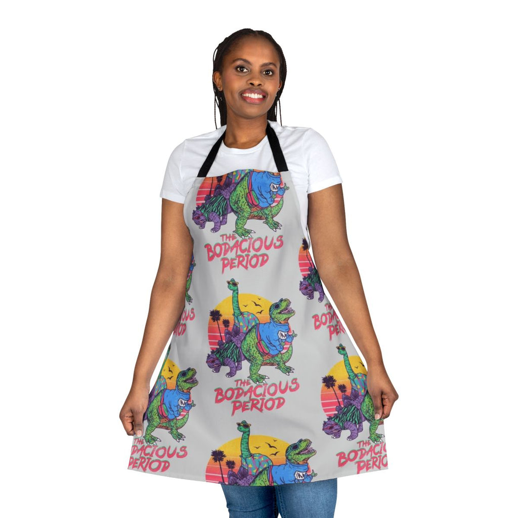 Vintage-inspired period apron featuring a whimsical dinosaur print - perfect for the modern, fashion-forward woman.