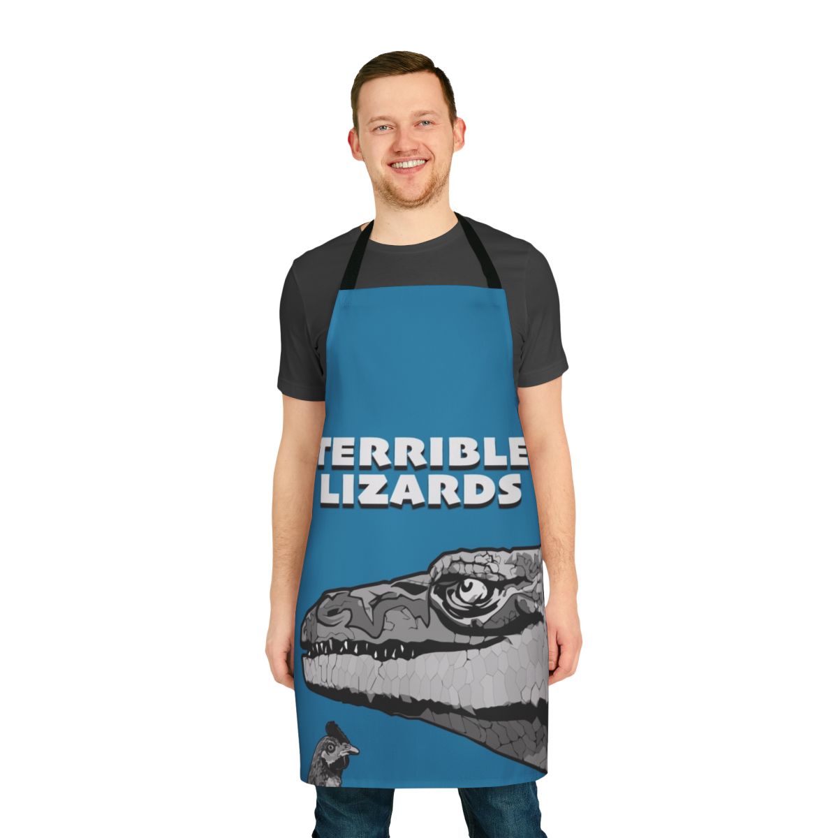 Dinosaur-themed apron featuring a Megalosaurus and other prehistoric lizards
