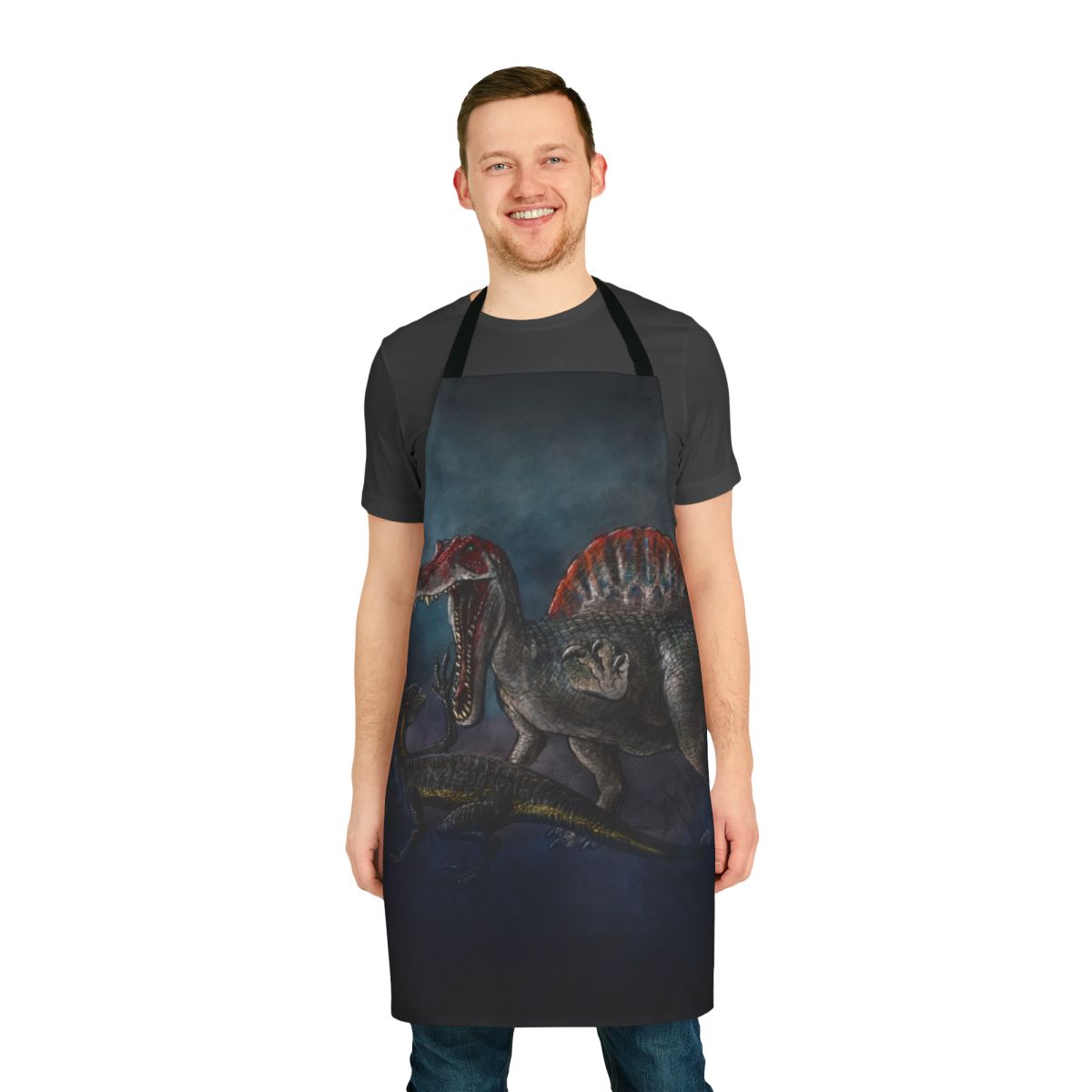 Apron featuring a dramatic dinosaur battle scene between Spinosaurus and Indominus Rex from the Jurassic world.