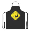 Illustration of a stick figure character on a 'Caution High Ground' apron, a humorous science fiction-themed kitchen accessory.