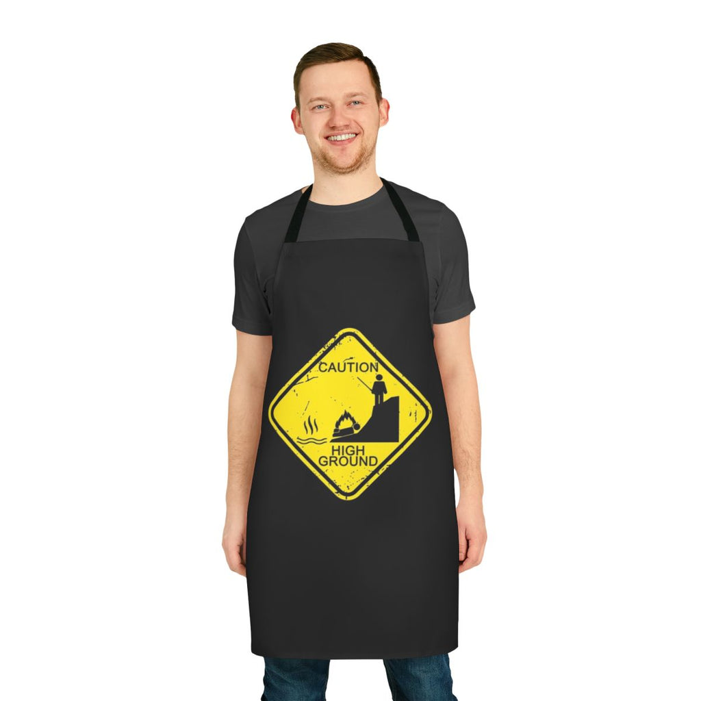 Illustration of a stick figure character on a 'Caution High Ground' apron, a humorous science fiction-themed kitchen accessory.