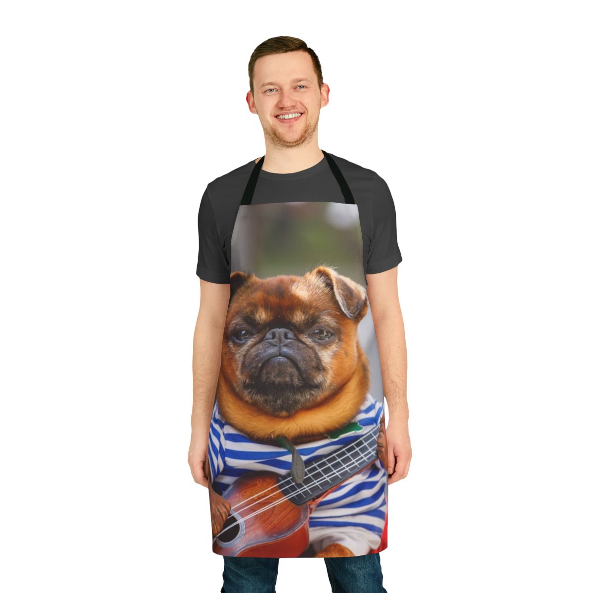 Pug dog playing an acoustic guitar on a black kitchen apron