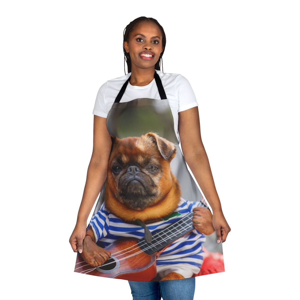Pug dog playing an acoustic guitar on a black kitchen apron