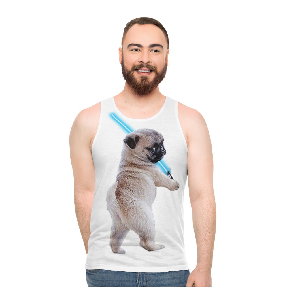Pug wearing a tank top and holding a lightsaber