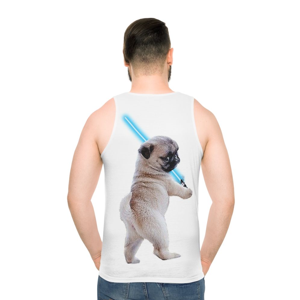 Pug wearing a tank top and holding a lightsaber