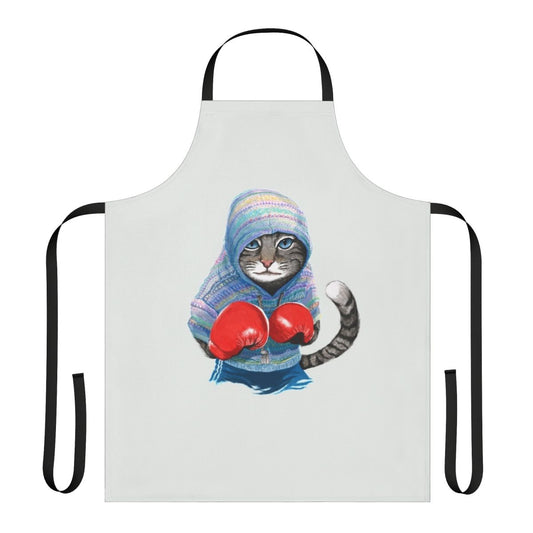 A blue and red patterned apron featuring a playful boxing cat design.