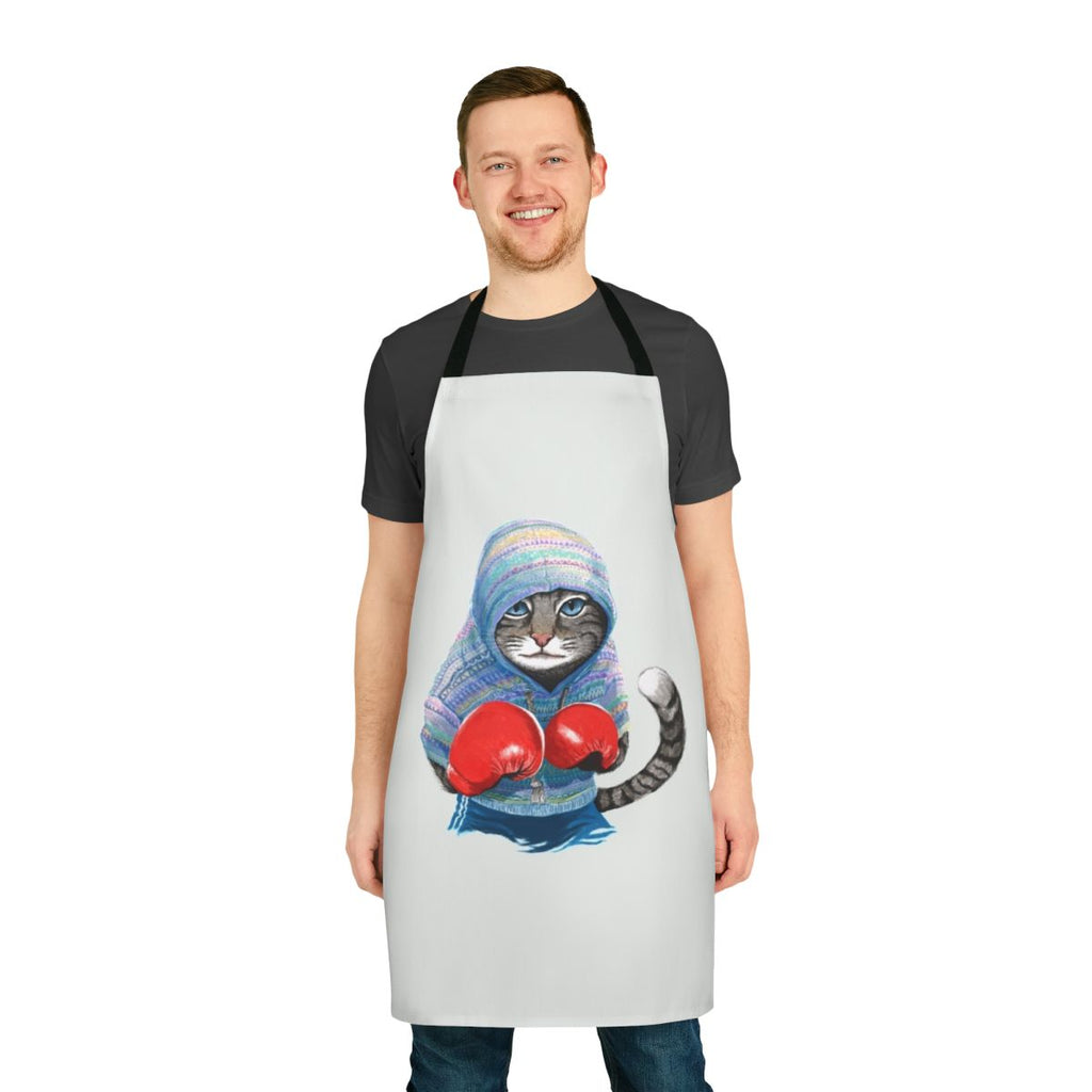 A blue and red patterned apron featuring a playful boxing cat design.