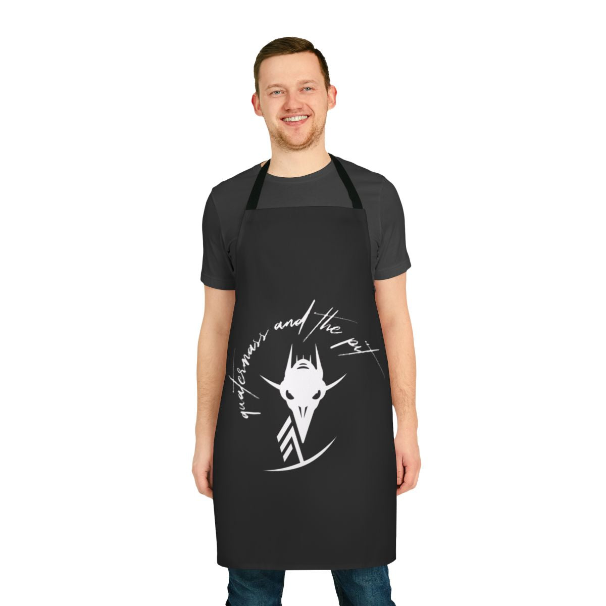 A black apron featuring a design inspired by the classic horror film "Quatermass and the Pit"