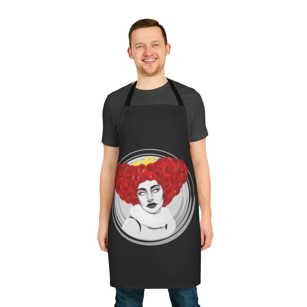 A woman wearing a Qveen Herby-inspired kitchen apron with the artist's name and album cover design.