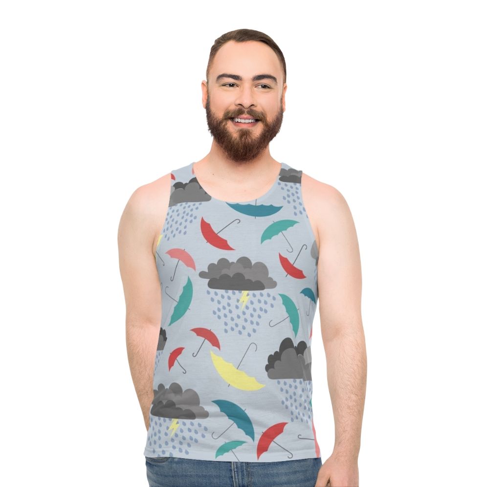 Rainy day unisex tank top with a colorful pattern of umbrellas, clouds, and lightning