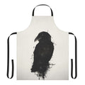 A raven-themed apron with a photomanipulated design featuring ink splatters and bird imagery