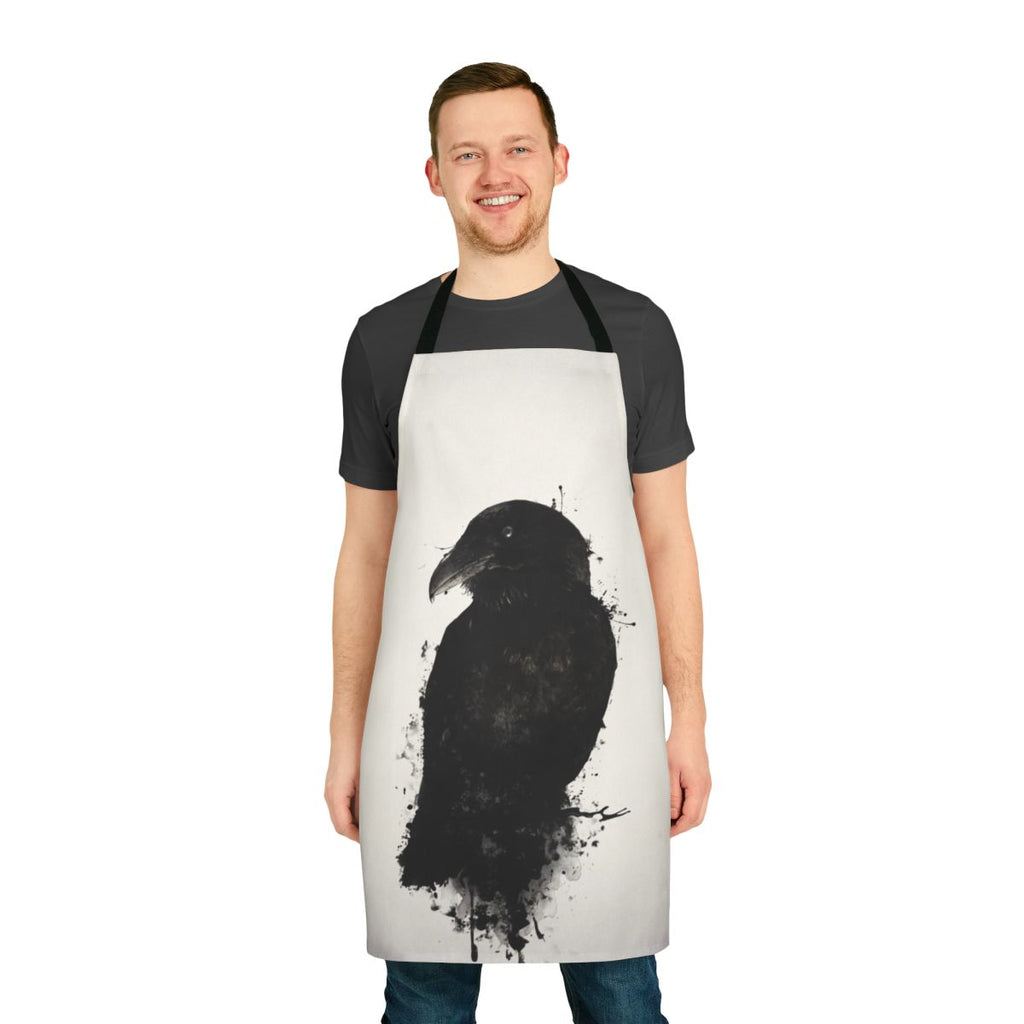 A raven-themed apron with a photomanipulated design featuring ink splatters and bird imagery