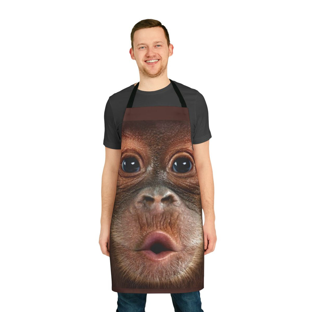 Realistic baby orangutan face printed on an apron, perfect for BBQ or wildlife enthusiasts.