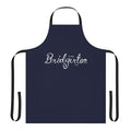 A white linen apron with a Regency-era inspired design, perfect for fans of the Bridgerton series.
