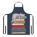 A grey apron with a cat sleeping design in blue and gold tones