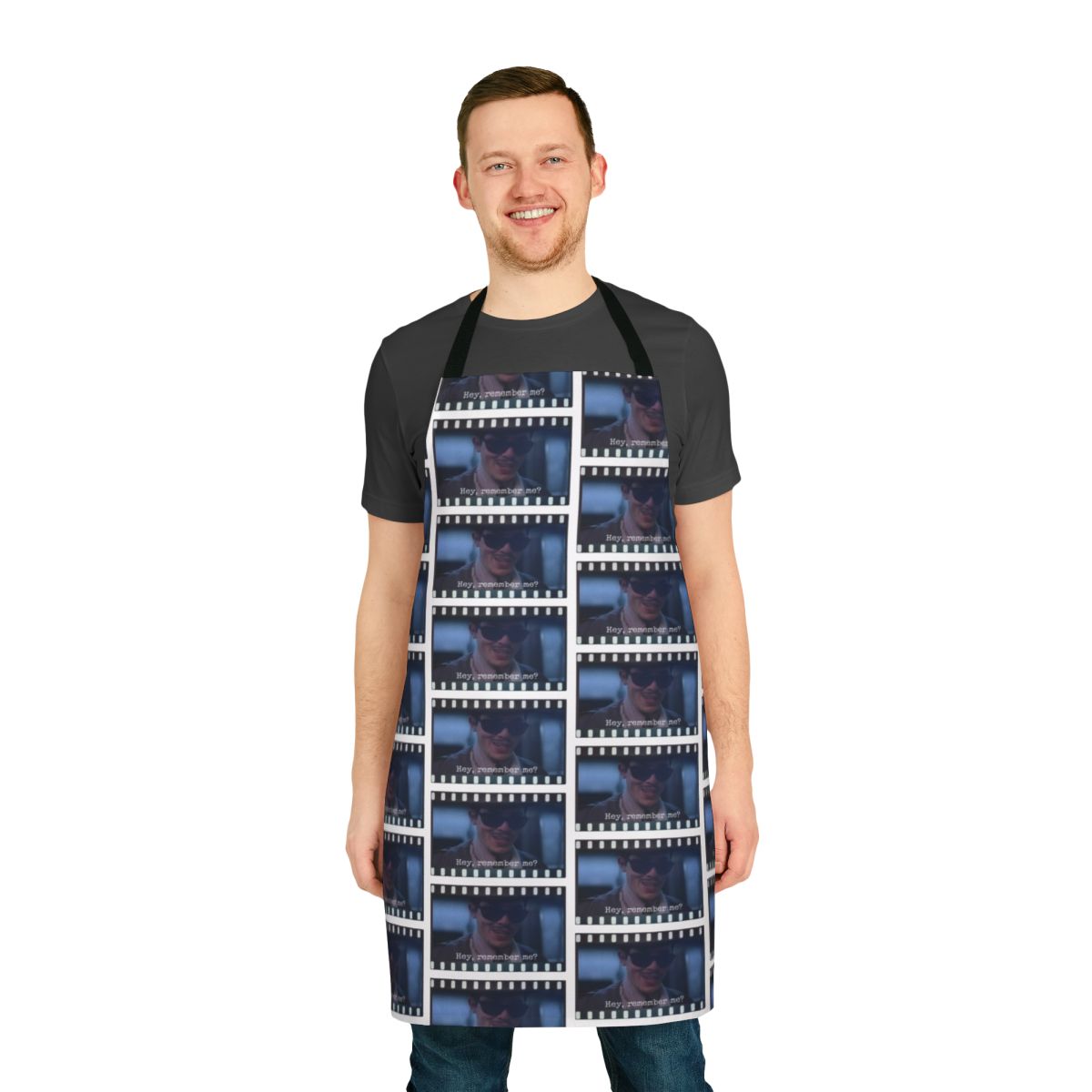 Apron featuring a film reel design and the quote "Remember Me" from the 90s cult classic movie.