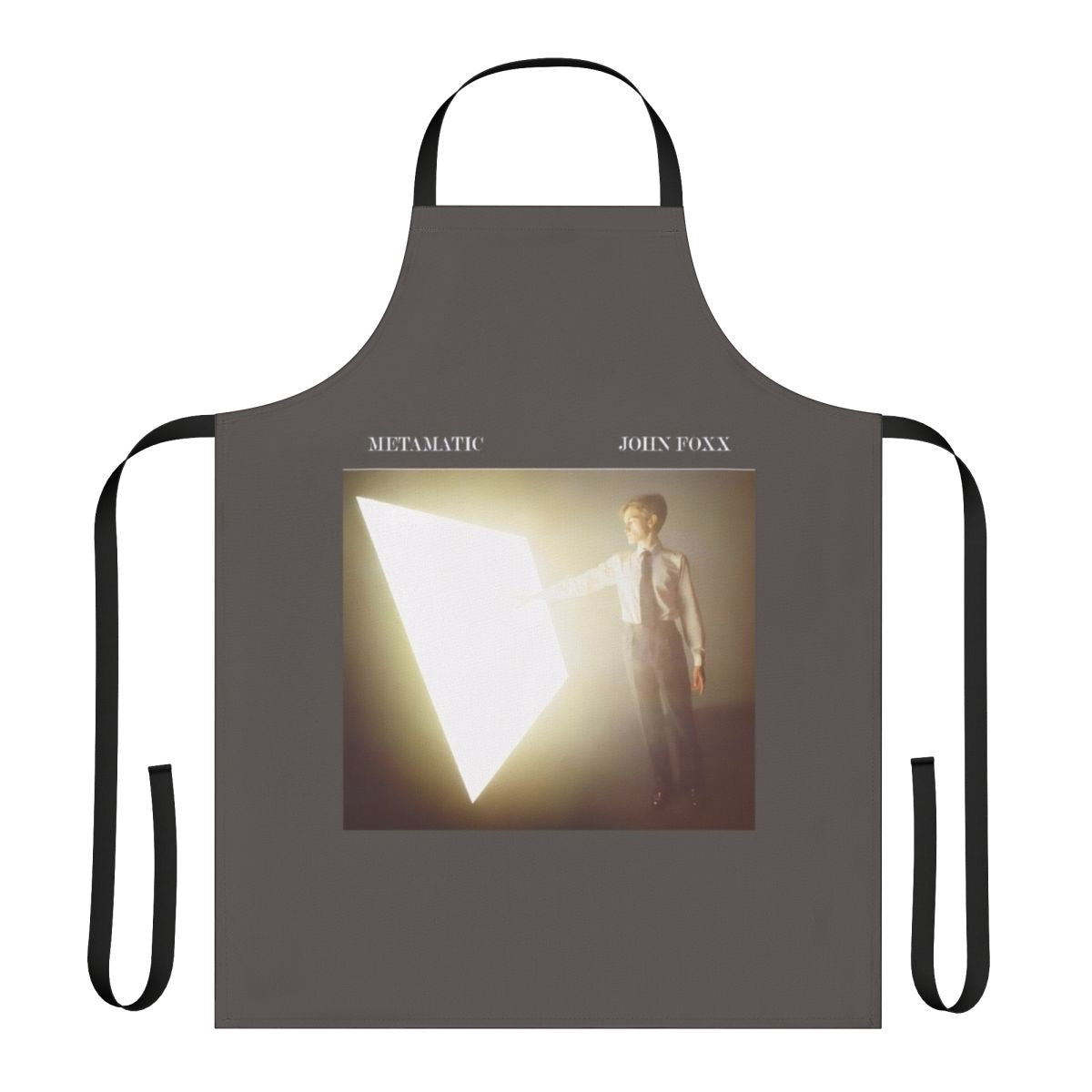 Retro 80s inspired apron featuring a graphic design inspired by the album artwork of John Foxx's 1980 album Metamatic