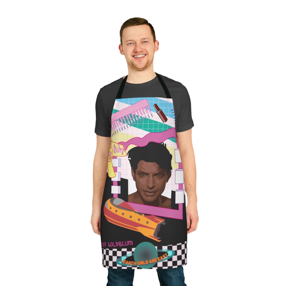 Colorful retro-style apron featuring illustrations of aliens, a spaceship, and a nod to the 1980s film "Earth Girls Are Easy"