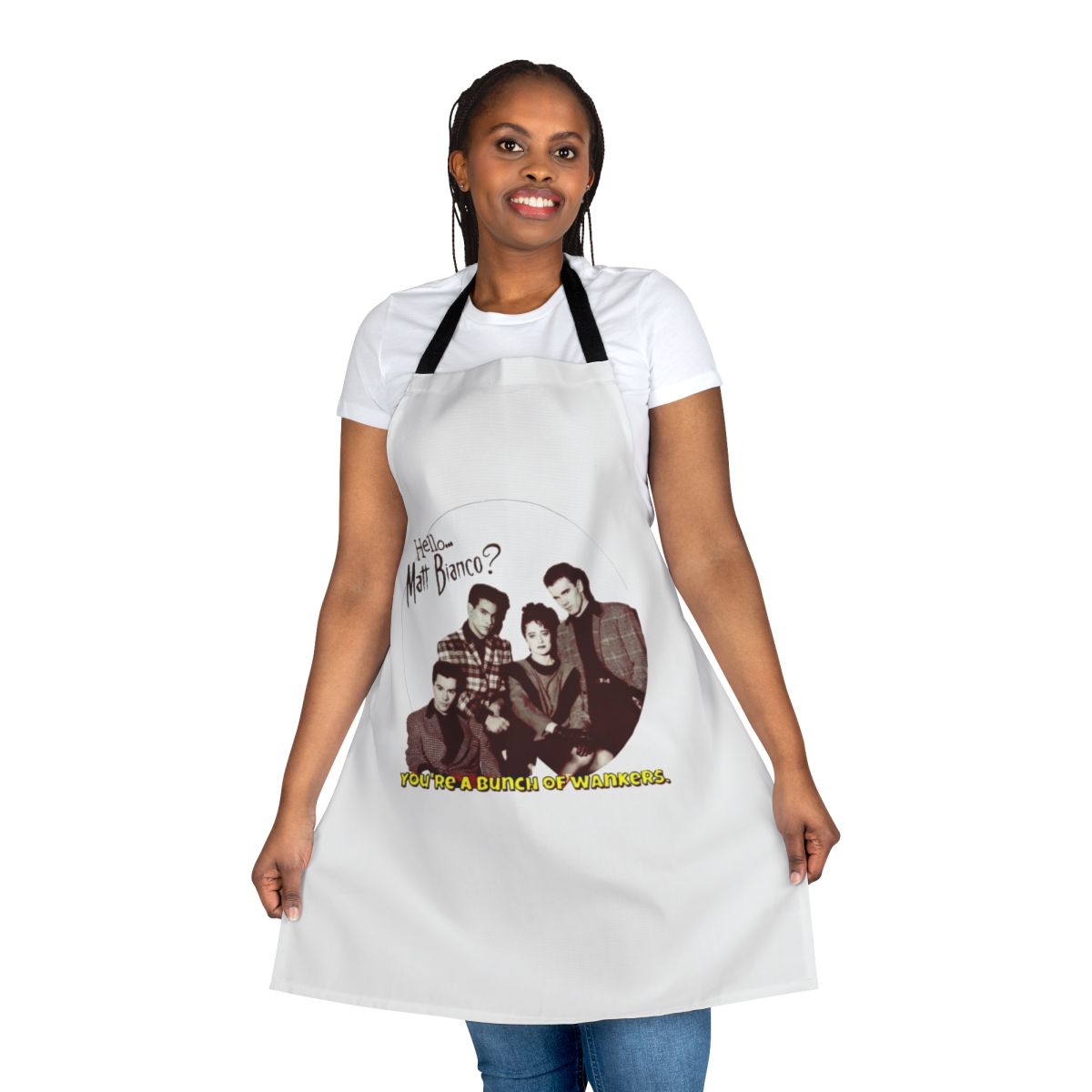 Retro-style 80s apron with "You're a Bunch of Wankers" text, inspired by the pop music group Matt Bianco and the TV show Saturday Superstore.