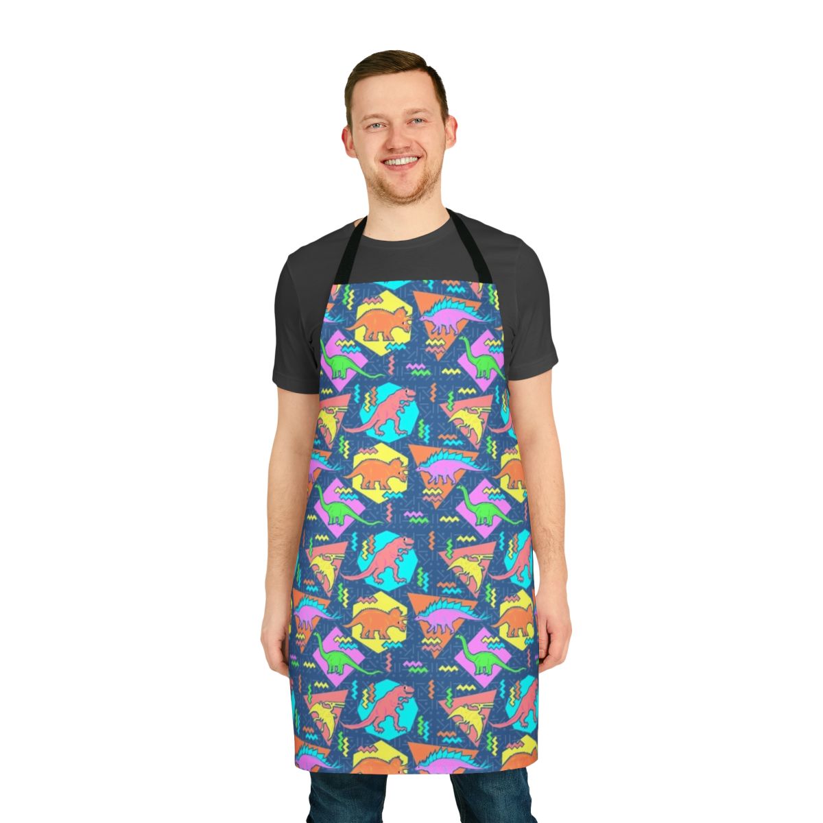 Apron featuring a 90s-inspired dinosaur pattern with geometric shapes and a retro, grunge-style design.