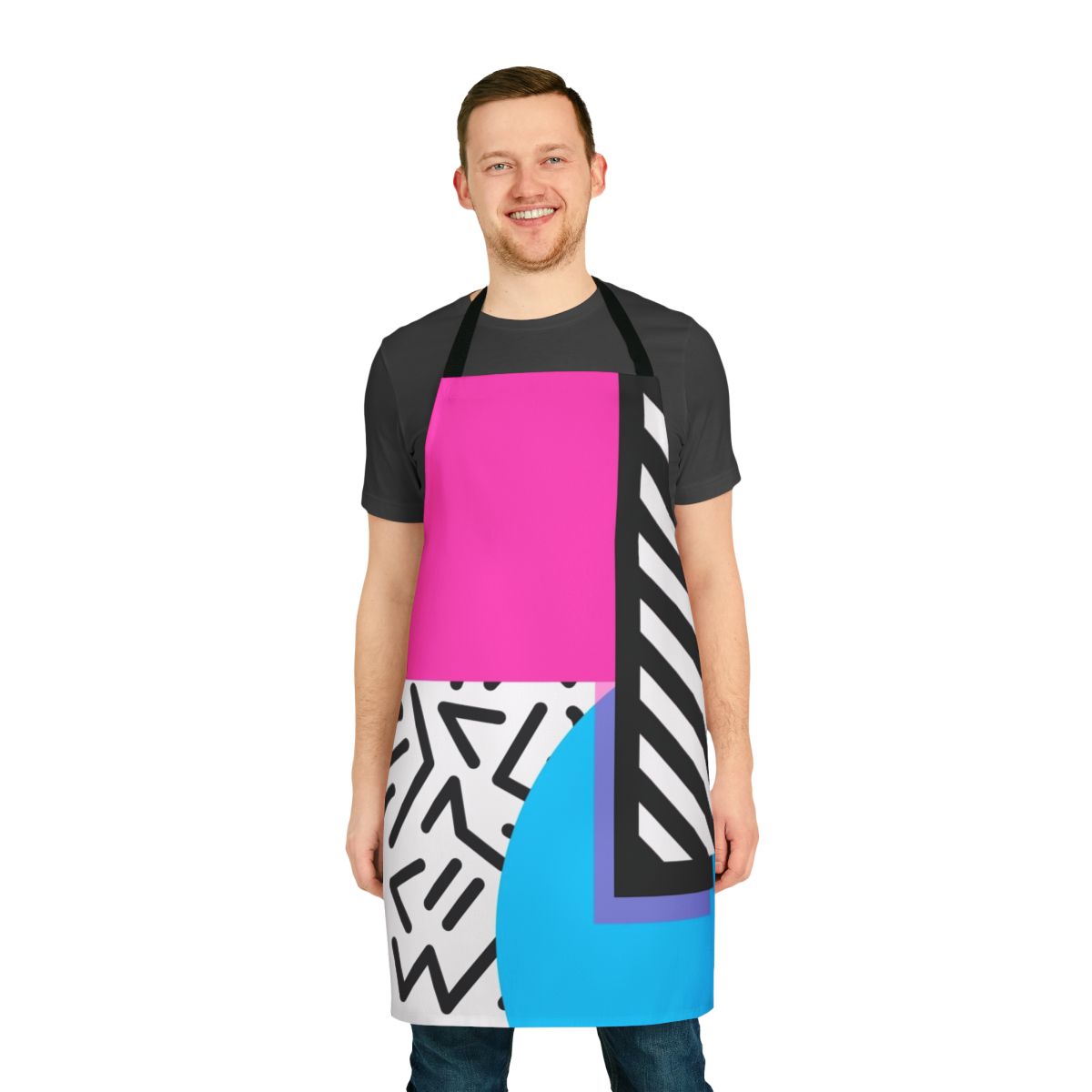 Colorful abstract apron featuring a retro Memphis-style geometric pattern in hot pink and other vibrant colors.