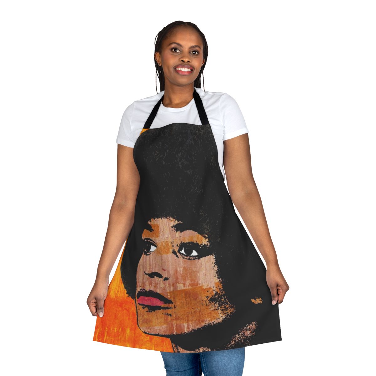 A colorful kitchen apron featuring a retro-style portrait of activist Angela Davis