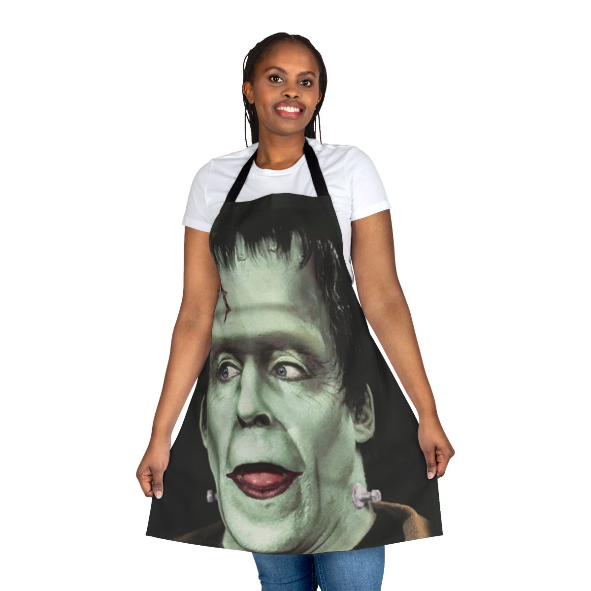 A colorful apron featuring a portrait of Herman Munster, the friendly Frankenstein-like character from the 1960s TV series The Munsters.