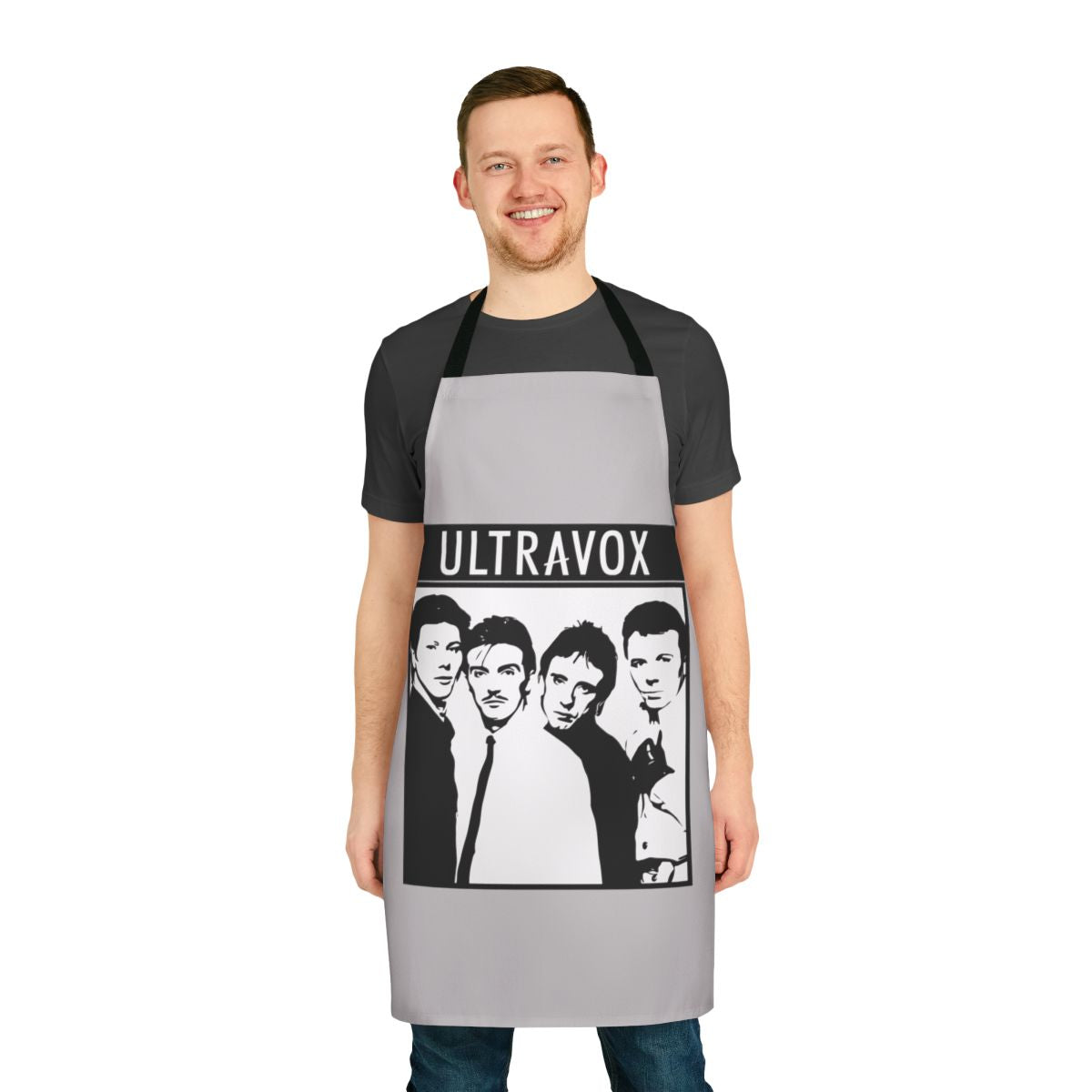 Retro band apron featuring the Ultravox logo and artwork, a nostalgic kitchen accessory for 1980s music fans.