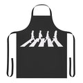 Vintage-style apron featuring iconic imagery and lyrics from the Beatles' classic album Abbey Road