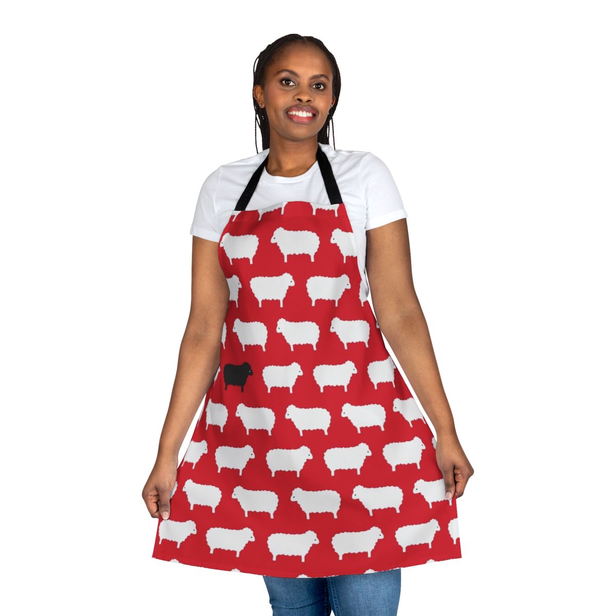 Vintage-style black and white sheep pattern apron inspired by the iconic black sheep sweater design